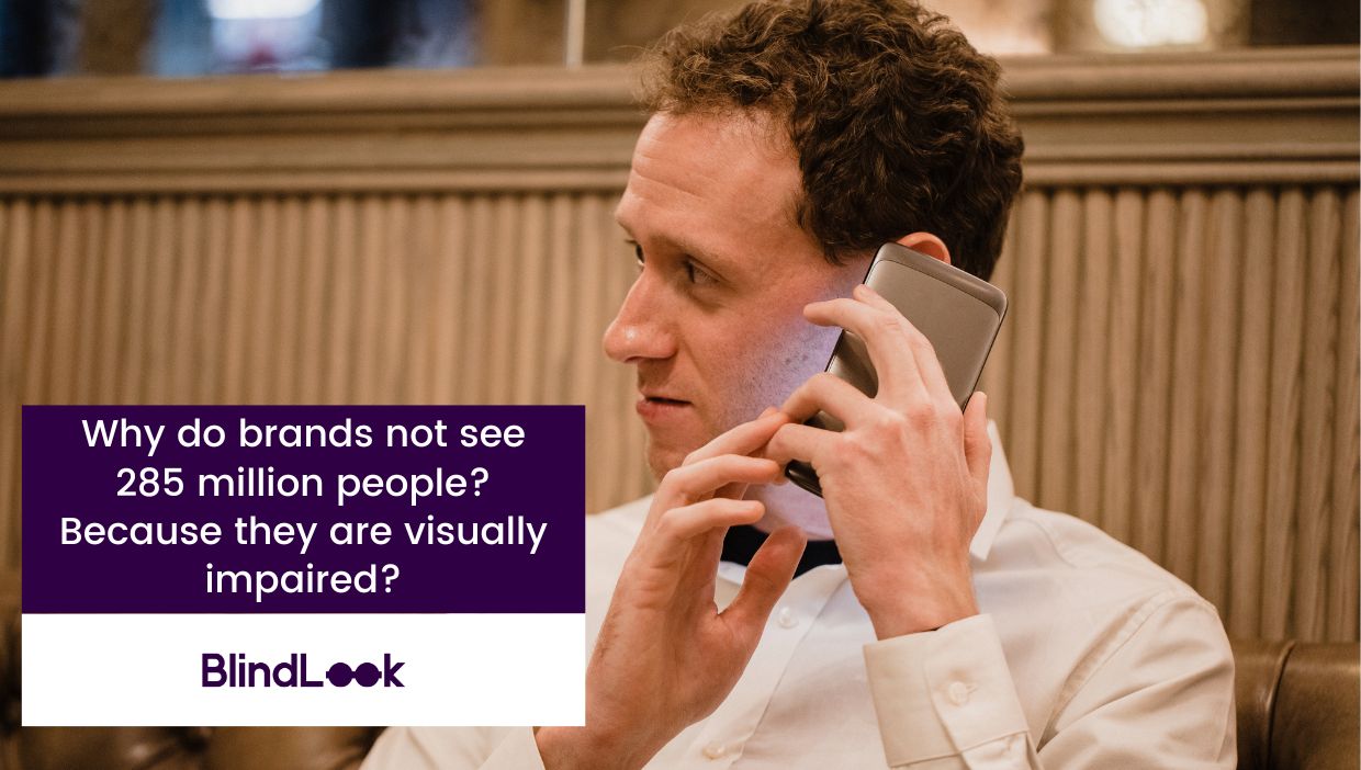 A visually impaired person using a phone.