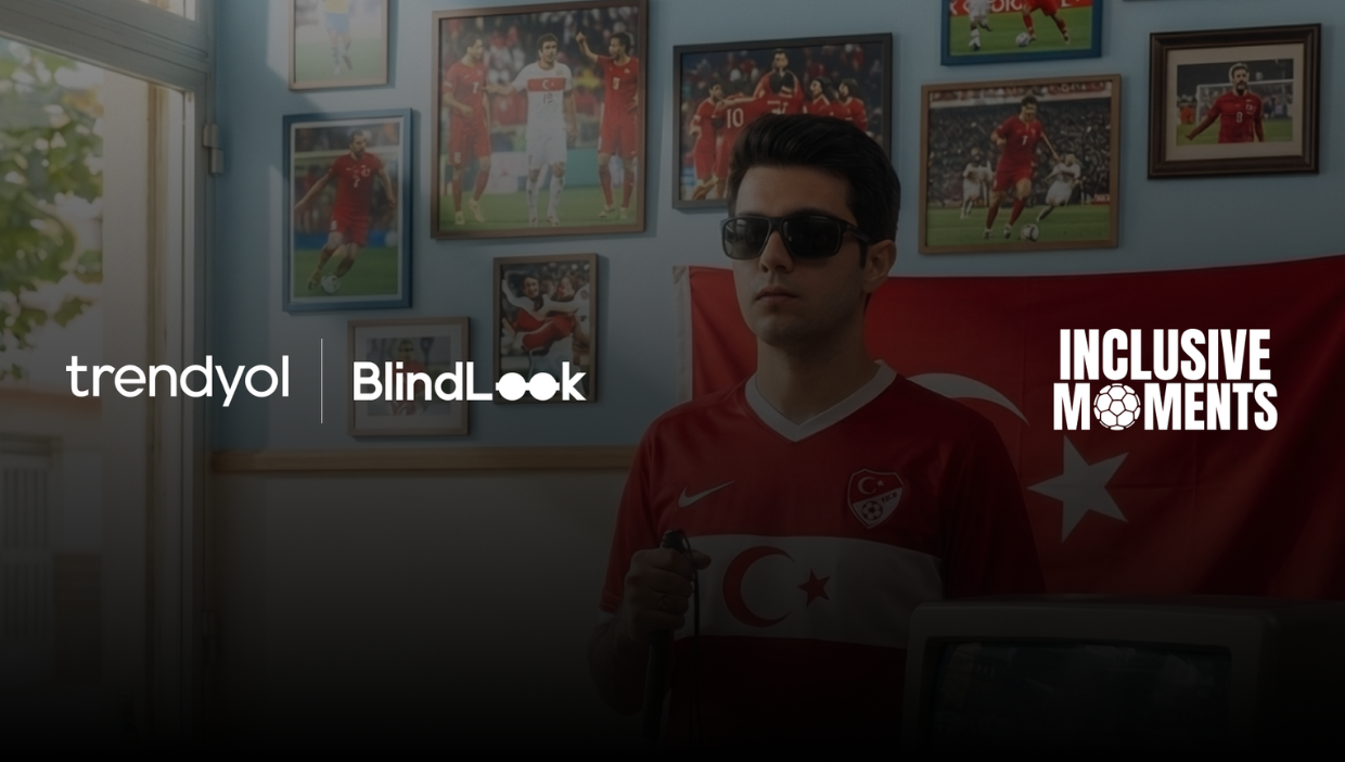 A visually impaired football fan wearing a Türkiye jersey stands in a room decorated with football photos and a Turkish flag, with Trendyol, BlindLook and Inclusive Moments logos overlaid.