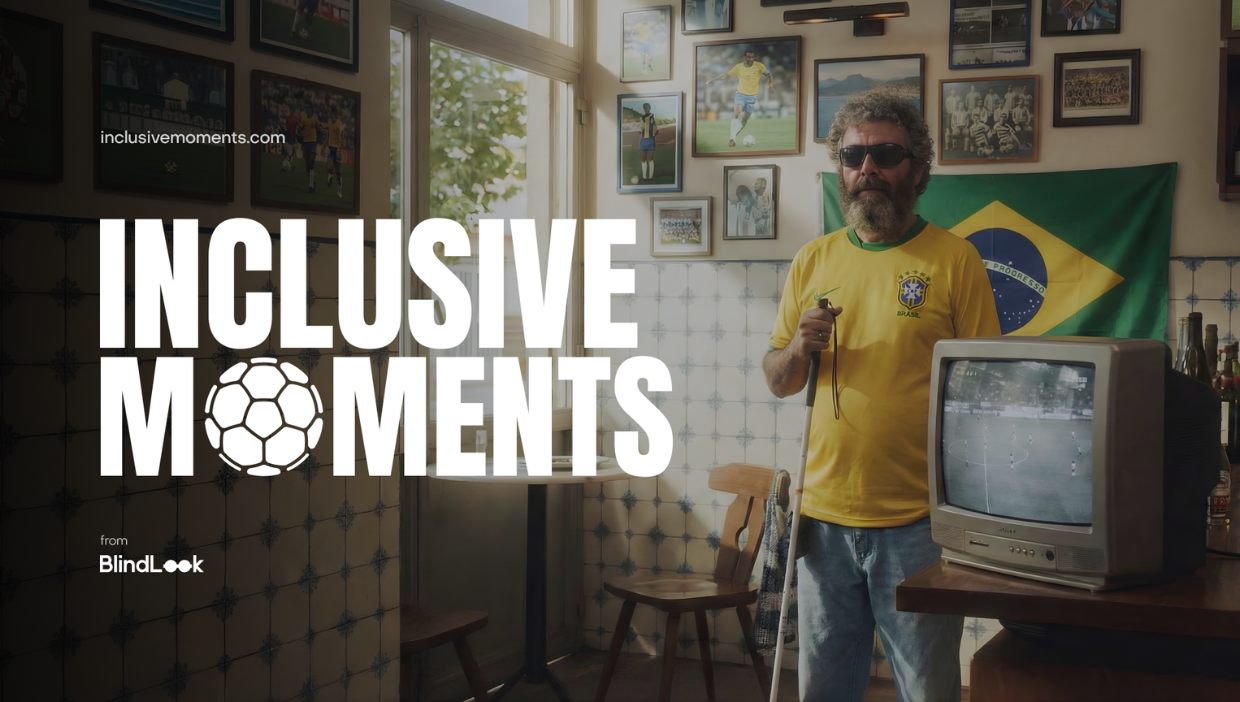 BlindLook Accessible Football Campaign Photo: Set in a Brazil-themed setting, the foreground shows a bearded man wearing a yellow Brazil national team jersey and sunglasses, holding a white cane. The background features a Brazilian flag, framed football photos, and an old-fashioned television broadcasting a match. Large white text reading INCLUSIVE MOMENTS with a soccer ball icon covers the left side of the image.