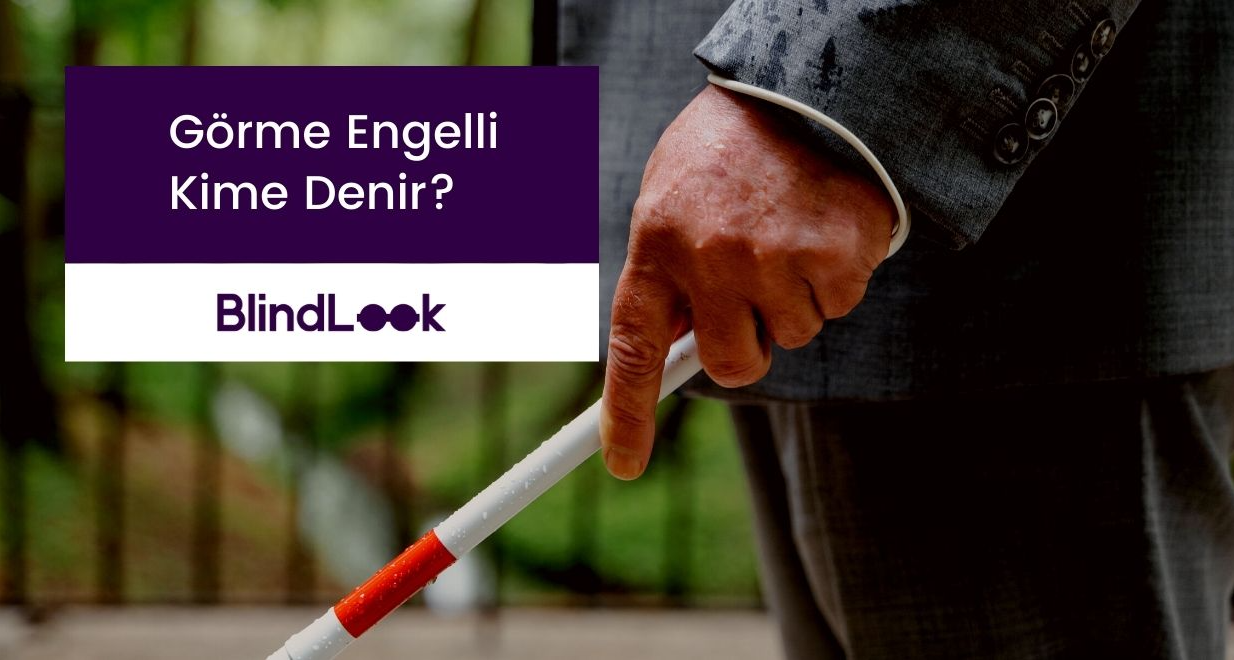 Ekranda bastonunu tutan bir görme engelli.